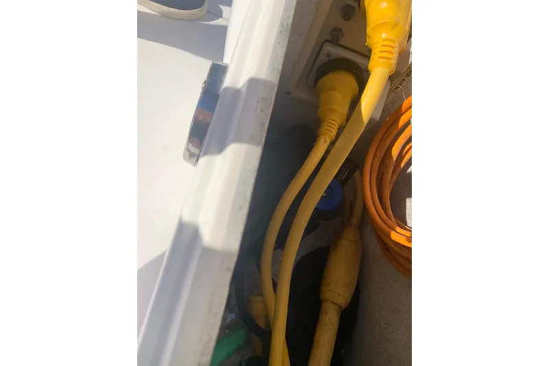 Slide: The Image of Dual Yellow power cables on a 1998 Cruisers 3375 Esprit boat. - 51