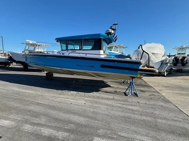 Slide: The Image of Axopar 28 Cabin 2023 - 2