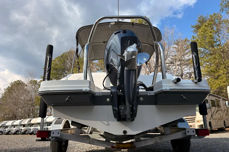 Slide: The Image of 2022 Hurricane SunDeck Sport 185 OB boat, rear view, on trailer, outdoors. - 3