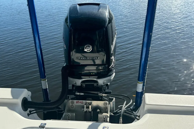 Slide: The Image of 2019 Sea Pro 248 Bay boat with Mercury FourStroke engine on calm water. - 4