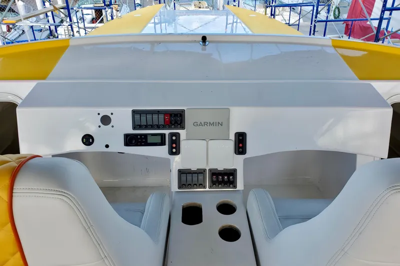 Slide: The Image of Cockpit of 2005 Thriller Powerboats Super Cat 55 with Garmin navigation system. - 15