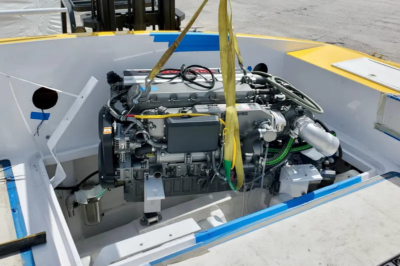 Slide: The Image of Engine installation in 2005 Thriller Powerboats Super Cat 55, showcasing detailed mechanical components. - 18