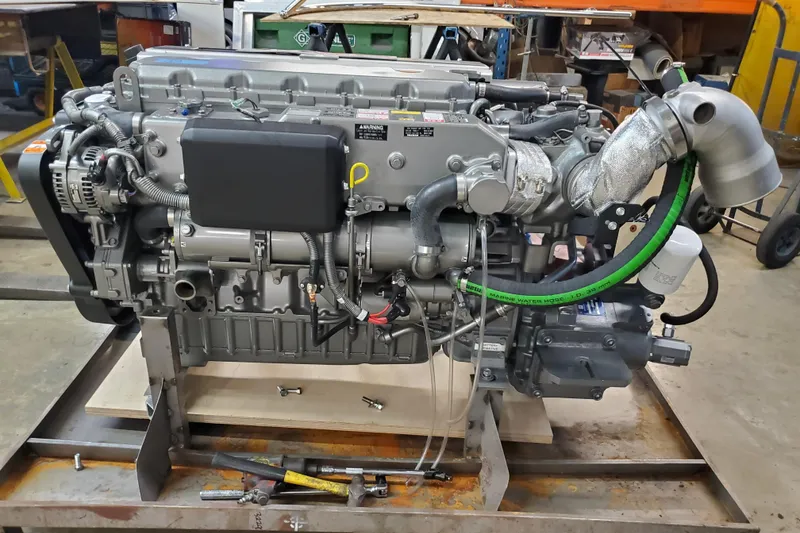 Slide: The Image of Engine of a 2005 Thriller Powerboats Super Cat 55, displayed in a workshop setting. - 22