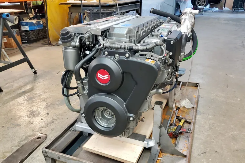 Slide: The Image of 2005 Thriller Powerboats Super Cat 55 engine in a workshop setting. - 23