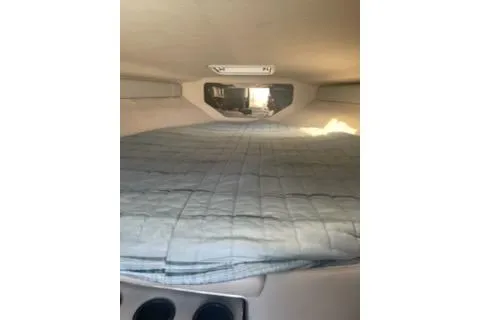 Slide: The Image of Interior cabin of 1996 Donzi 275 LXC boat with bed and lighting. - 20