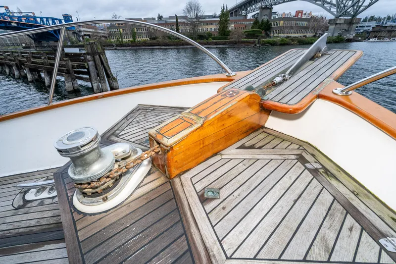 Slide: The Image of Deck of 1973 American Marine Alaskan 53 yacht with wooden details and anchor. - 52