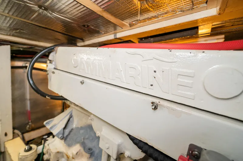 Slide: The Image of Engine room of 1973 American Marine Alaskan 53 yacht, featuring marine equipment. - 79