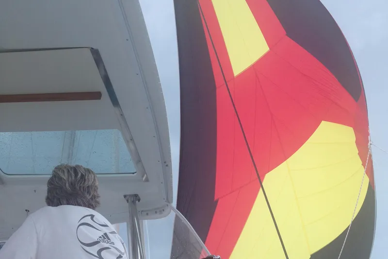 Slide: The Image of Lagoon 420 sailboat with colorful sail, year 2007. - 11