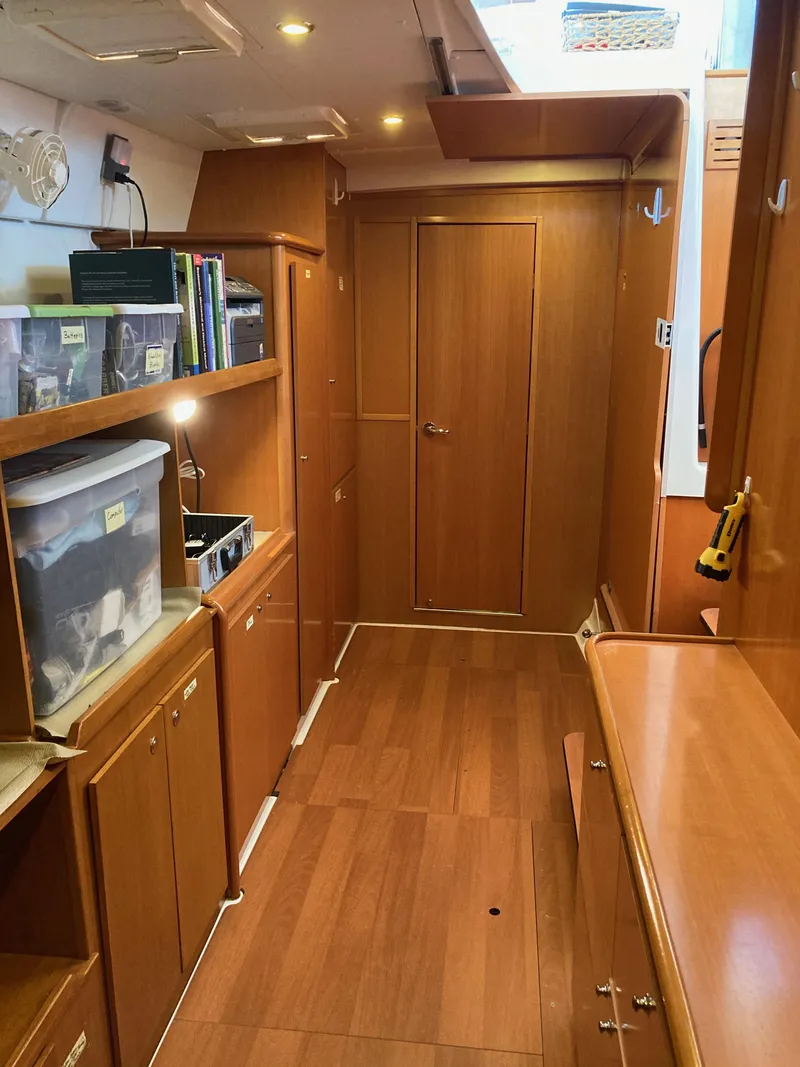 Slide: The Image of Interior of a 2007 Lagoon 420 yacht with wooden paneling. - 34