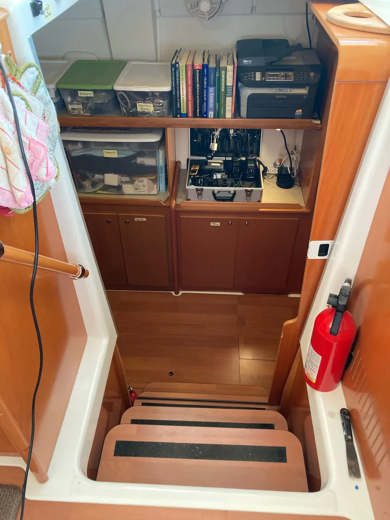 Slide: The Image of Interior of Lagoon 420 yacht with stairs and storage area. - 43