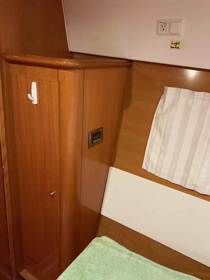 Slide: The Image of Interior of a 2007 Lagoon 420 yacht with wood paneling. - 44