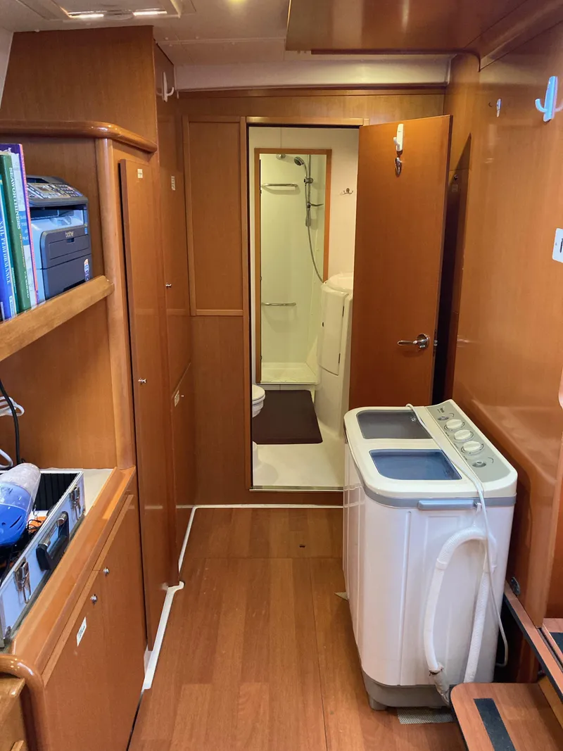 Slide: The Image of Interior of a 2007 Lagoon 420 yacht with washing machine. - 47