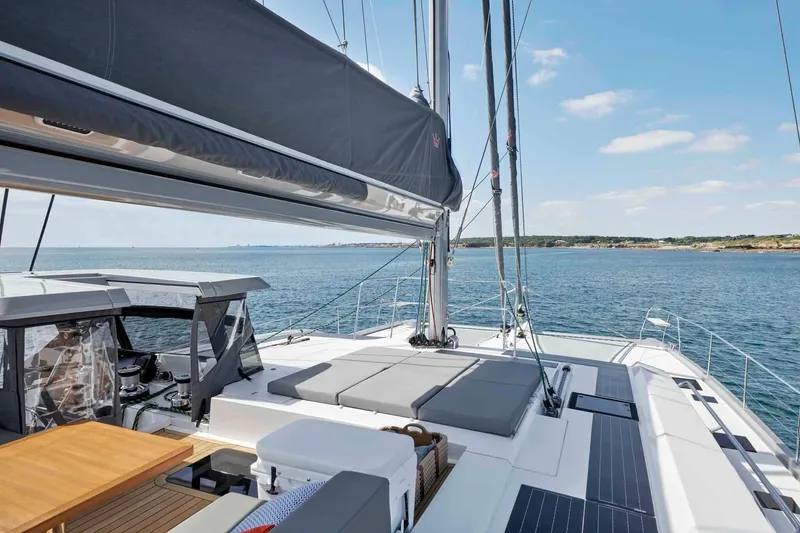 Slide: The Image of Luxury Privilege Signature 580 yacht deck, 2025 model, sailing on a sunny day. - 17