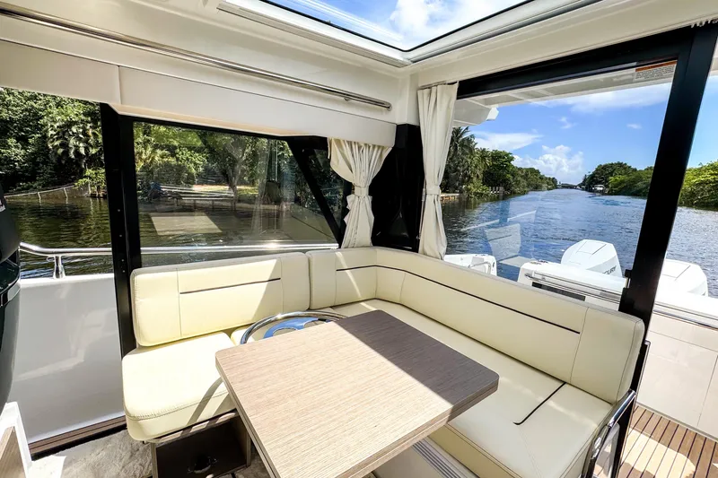 Slide: The Image of Interior of 2025 Wellcraft 38 Explorer yacht with scenic river view. - 20
