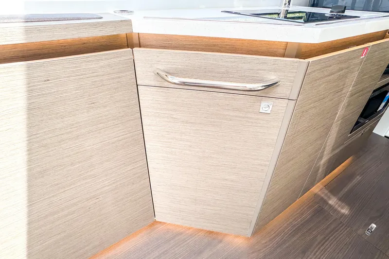 Slide: The Image of Modern kitchen cabinetry in the 2025 Wellcraft 38 Explorer yacht. - 26