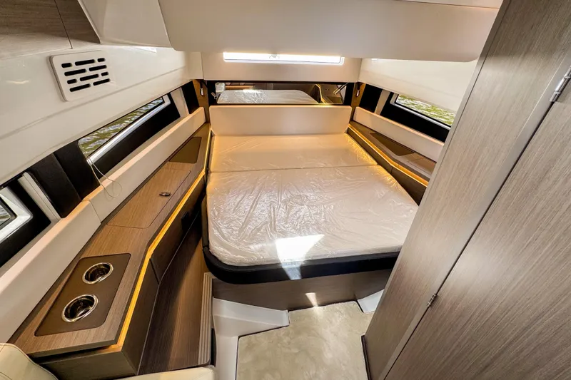 Slide: The Image of Luxurious interior cabin of 2025 Wellcraft 38 Explorer yacht with modern furnishings. - 35