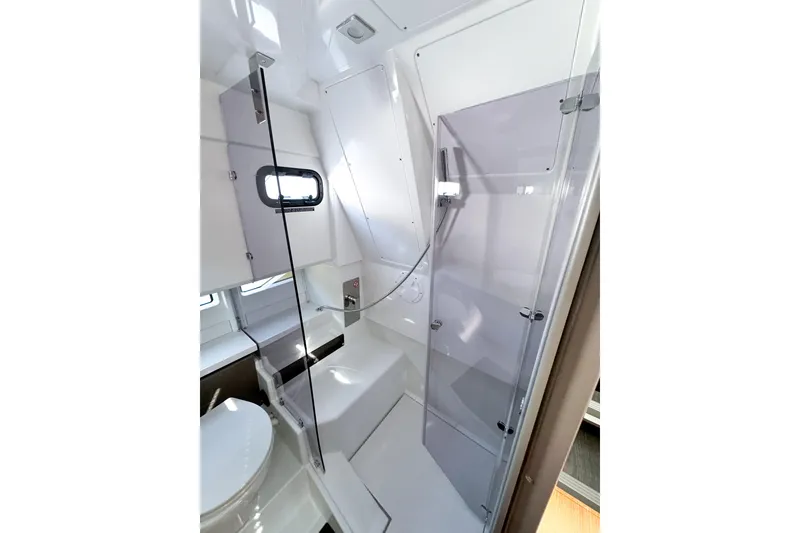 Slide: The Image of Modern bathroom in 2025 Wellcraft 38 Explorer yacht with sleek shower and toilet. - 39