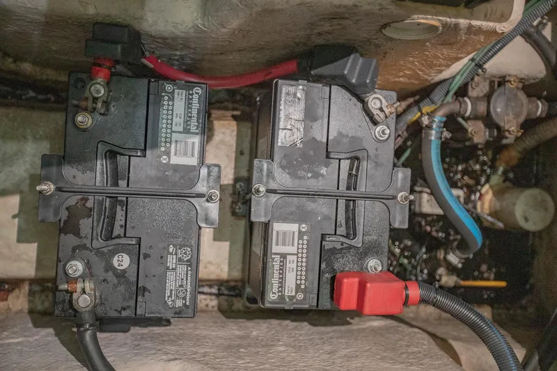 Slide: The Image of Dual batteries in a 2005 Sea Ray 420 Sundancer engine compartment. - 32
