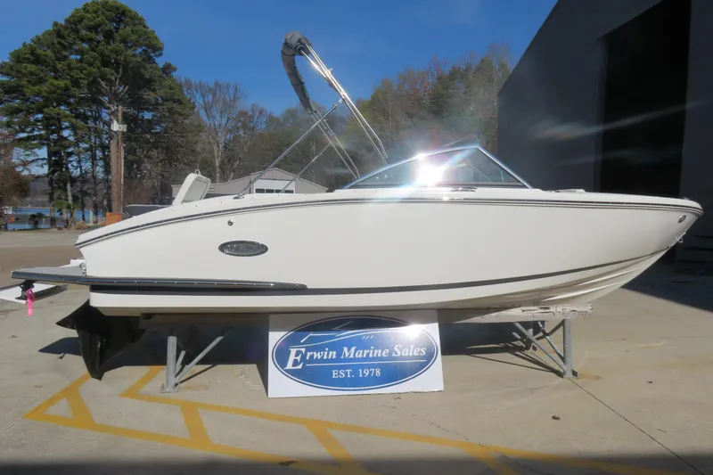 Slide: The Image of 2023 Cobalt CS22 boat displayed at Erwin Marine Sales dealership. - 1