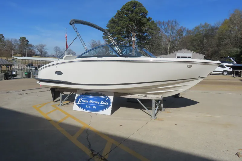 Slide: The Image of 2023 Cobalt CS22 boat displayed at Erwin Marine Sales dealership. - 2