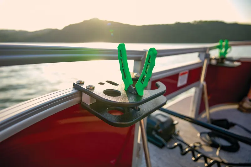Slide: The Image of Manufacturer Provided Image: 2026 Sun Tracker Bass Buggy 16 XL Select boat with fishing rod holder at sunset. - 68