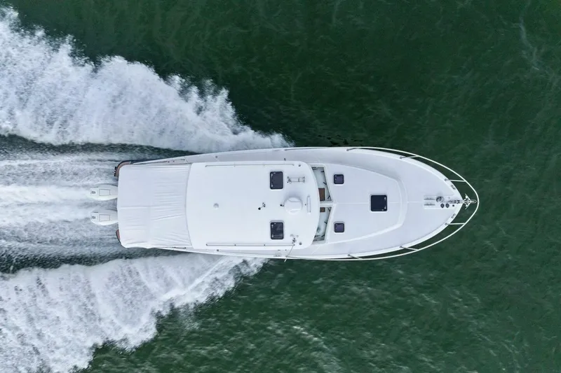 Slide: The Image of Aerial view of 2025 MJM 35 yacht cruising on open water. - 47