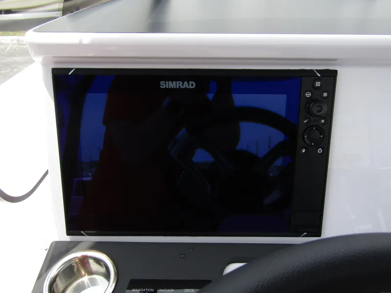 Slide: The Image of Simrad display on 2024 Axopar 25 Cross Top boat dashboard. - 15