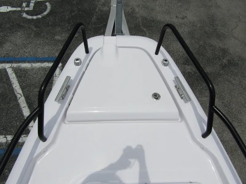 Slide: The Image of Bow of 2024 Axopar 25 Cross Top boat with black railings. - 8