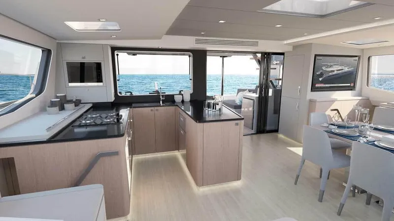 Slide: The Image of Luxurious interior of 2025 Privilege Signature 580 yacht with modern kitchen and dining area. - 29