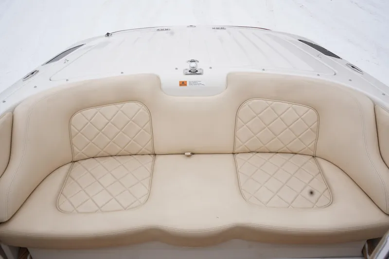 Slide: The Image of 2015 Chris-Craft Lancer 20 boat with beige quilted seating. - 25