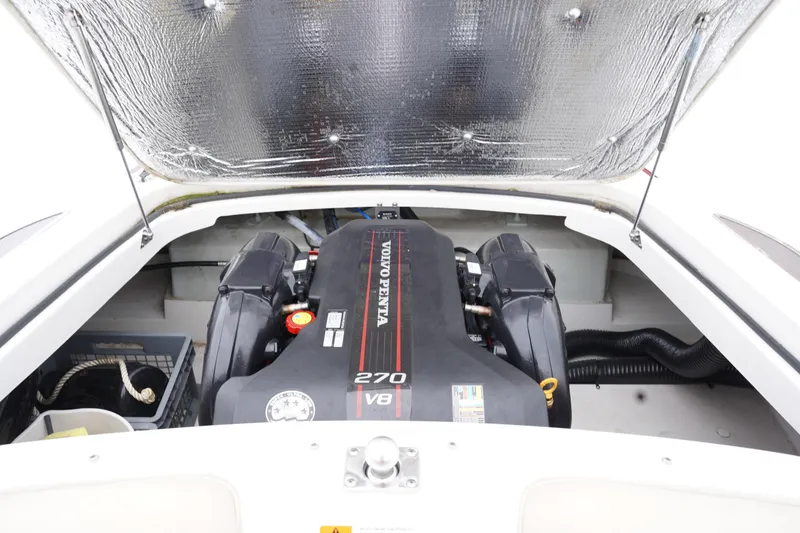 Slide: The Image of Engine compartment of 2015 Chris-Craft Lancer 20 with Volvo Penta 270 V8 engine. - 28