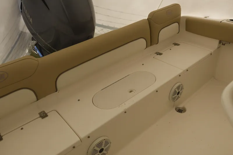 Slide: The Image of 2017 Key West 219 FS boat interior with seating and Yamaha engine. - 6