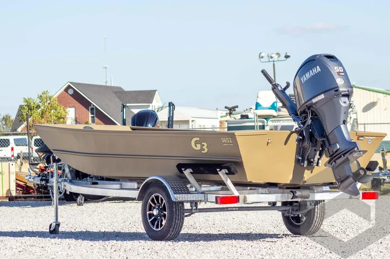 Slide: The Image of 2026 G3 Gator Tough 1652 VBW boat on trailer with Yamaha outboard motor. - 10