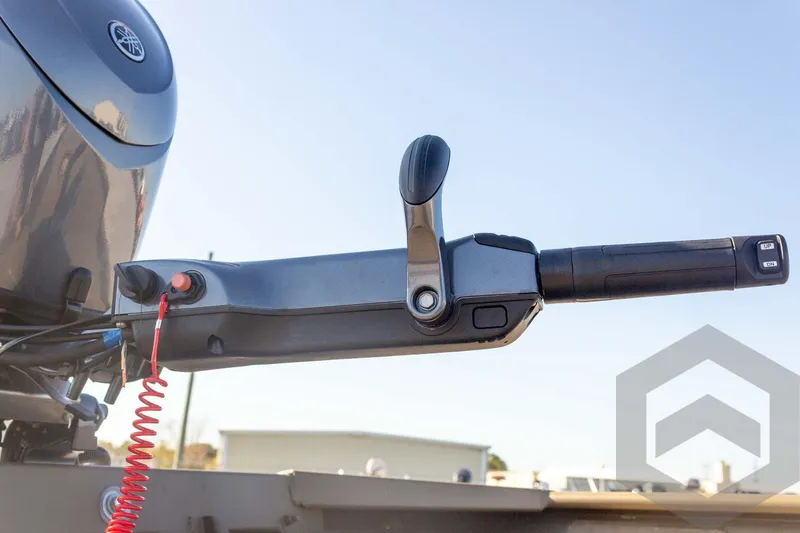 Slide: The Image of Outboard motor control handle on 2026 G3 Gator Tough 1652 VBW boat. - 24