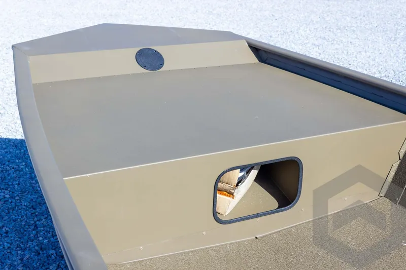 Slide: The Image of 2026 G3 Gator Tough 1652 VBW boat deck with storage compartment. - 27