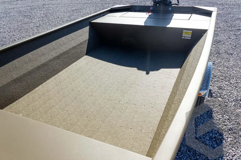 Slide: The Image of 2026 G3 Gator Tough 1652 VBW boat on gravel, showcasing spacious interior. - 28