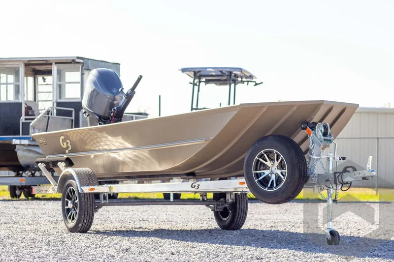 Slide: The Image of 2026 G3 Gator Tough 1652 VBW boat on trailer, outdoor setting. - 3