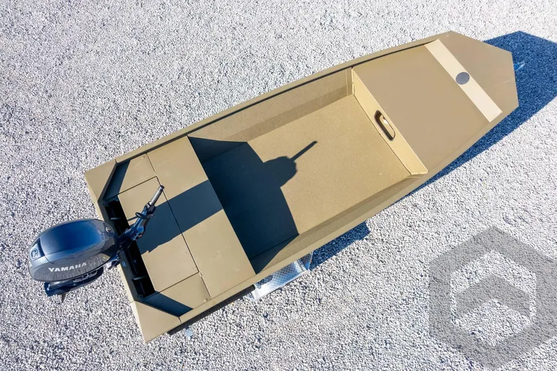 Slide: The Image of 2026 G3 Gator Tough 1652 VBW boat with Yamaha motor on gravel surface. - 42