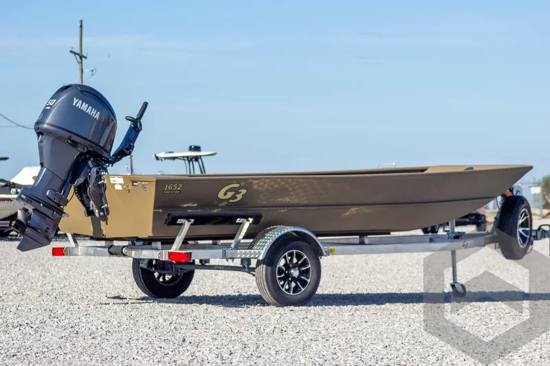 Slide: The Image of 2026 G3 Gator Tough 1652 VBW boat on trailer with Yamaha outboard motor. - 8
