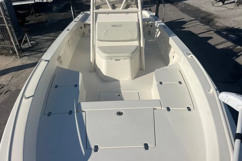 Slide: The Image of 2017 Pathfinder 2600 TRS boat interior, featuring spacious seating and storage compartments. - 11