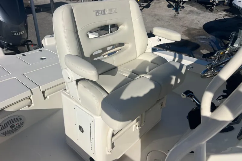 Slide: The Image of White captain's chair on 2017 Pathfinder 2600 TRS boat, featuring comfortable armrests and sleek design. - 15