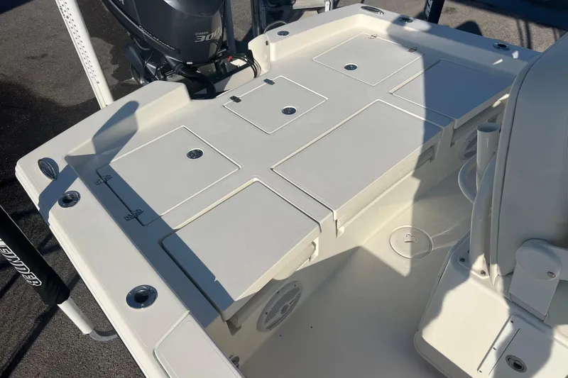 Slide: The Image of 2017 Pathfinder 2600 TRS boat deck with storage compartments and Yamaha 300 engine. - 16