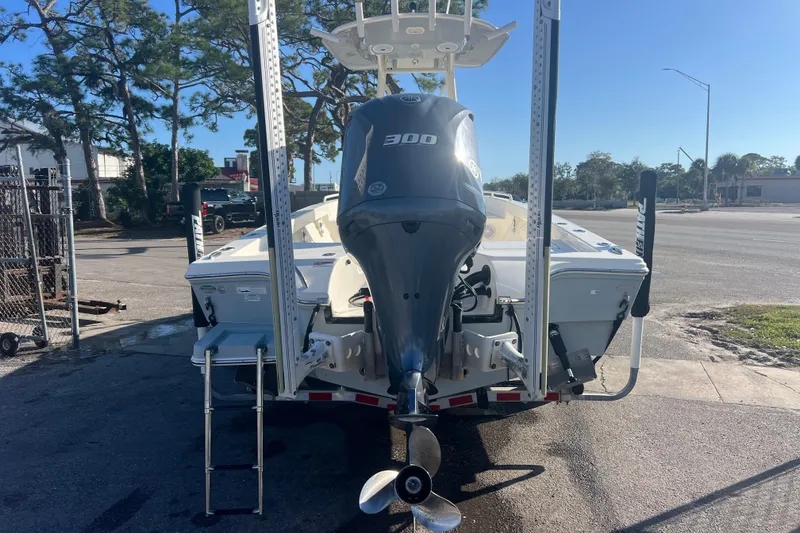 Slide: The Image of 2017 Pathfinder 2600 TRS boat with powerful 300 HP engine, parked outdoors. - 4