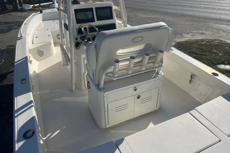 Slide: The Image of 2017 Pathfinder 2600 TRS boat interior with helm and seating area. - 6