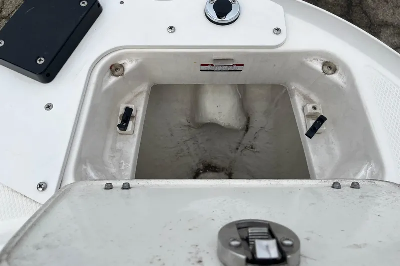 Slide: The Image of 2020 Chaparral 21 SSi Ski & Fish boat storage compartment, open and empty. - 4