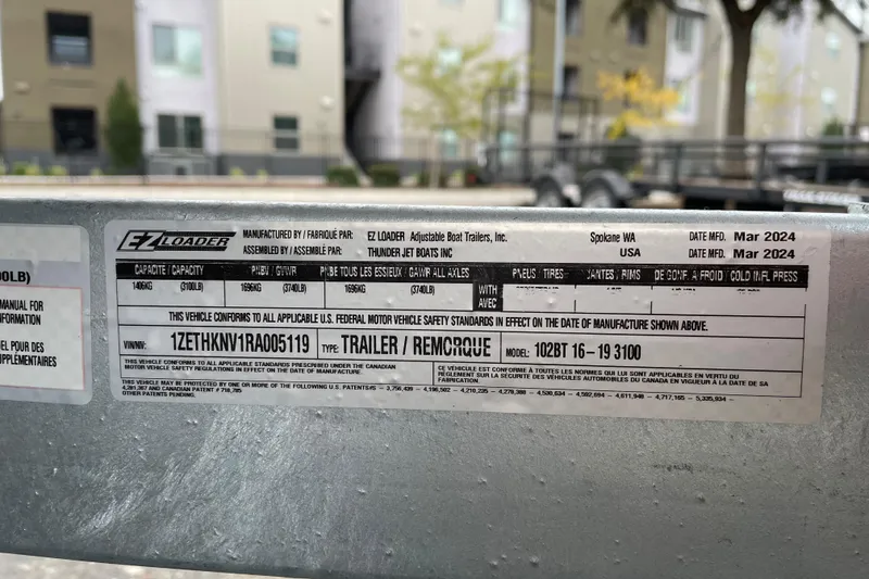Slide: The Image of Trailer label with specifications, including VIN and manufacturing details, Spartan 185 Astoria 2024. - 44