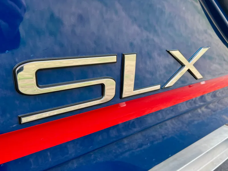 Slide: The Image of Close-up of Sea Ray SLX 260 Outboard emblem, 2024 model. - 24
