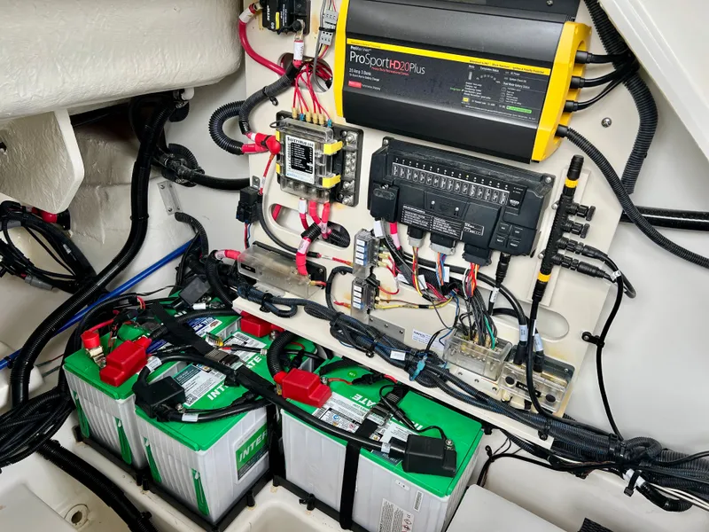Slide: The Image of Electrical system of 2024 Sea Ray SLX 260 Outboard with batteries and wiring. - 27