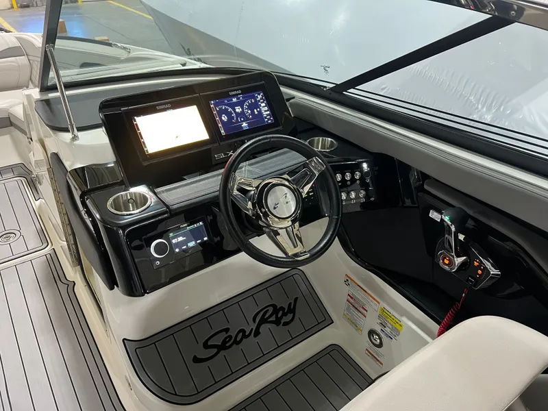 Slide: The Image of 2024 Sea Ray SLX 260 Outboard on trailer outdoors. - 3