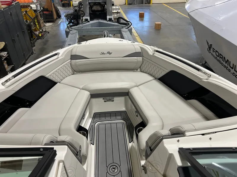 Slide: The Image of 2024 Sea Ray SLX 260 Outboard on trailer, side view. - 4